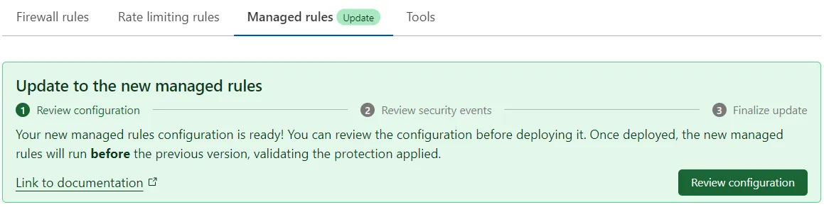 The migration banner displayed to Enterprise customers in WAF > Managed rules.